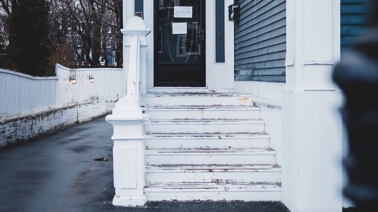 Scuffed up white porch