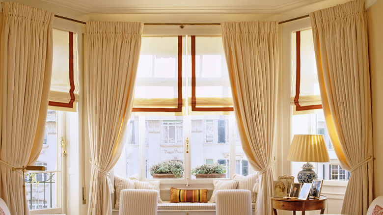 Dressed bay window curtain rods