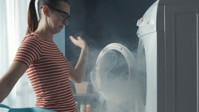 Dad unloads dryer with son