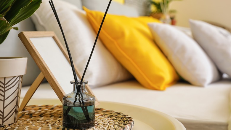 reed diffuser on nightstand