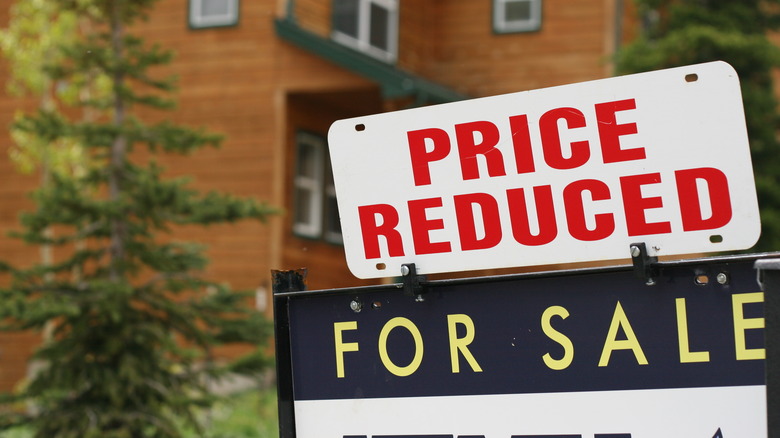 Home with reduce price sign