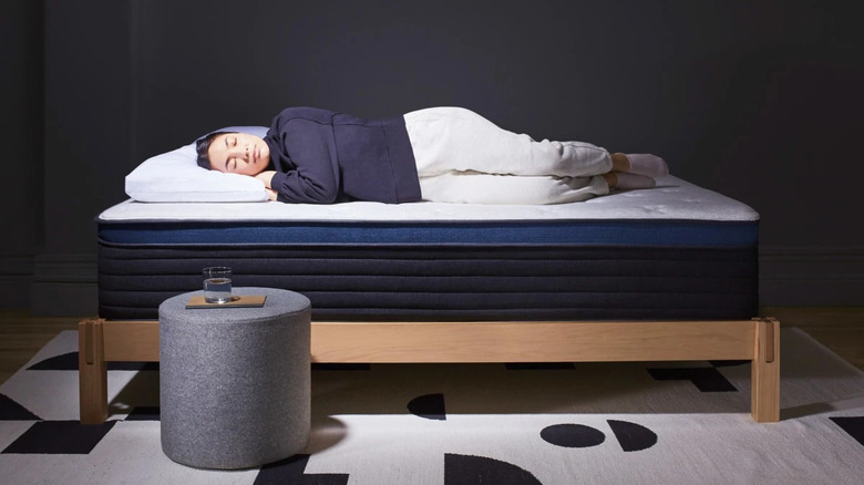 Woman sleeping on Helix mattress