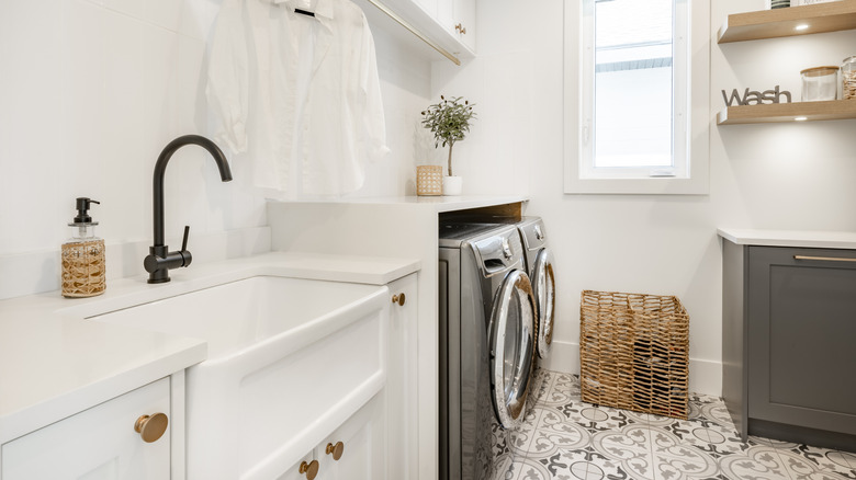 laundry room with tile floor