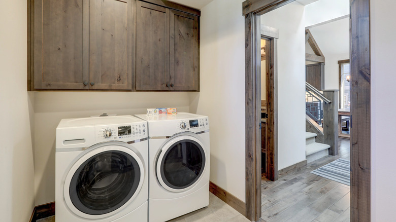 laundry room with wood door frame