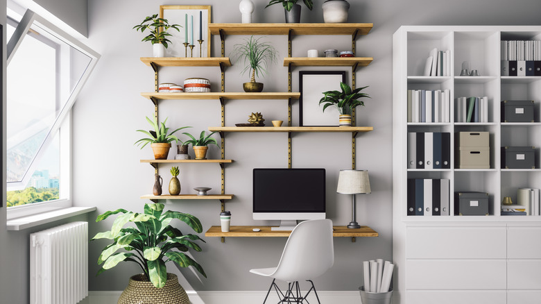 stack of books in front of a bookcase