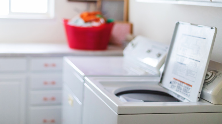 Washer and dryer in room