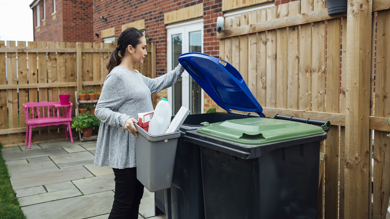 Why You Should Let Your Garbage Can Sit In The Sun After Washing It
