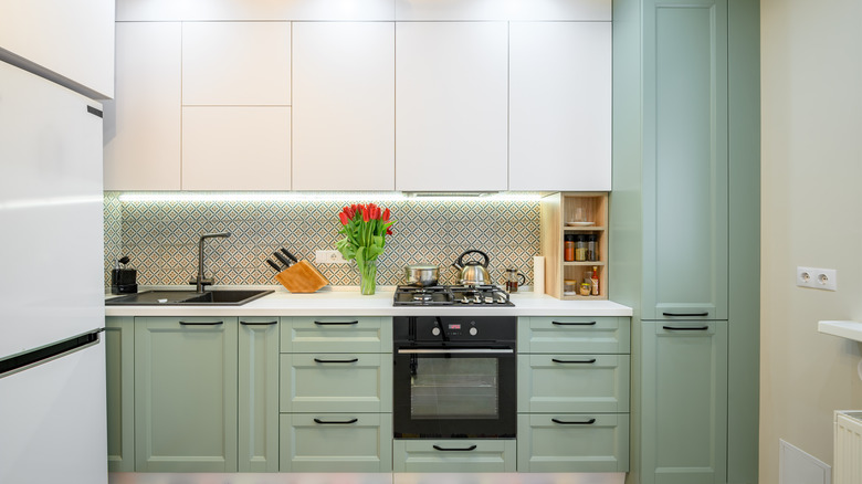 mint green cabinets in kitchen