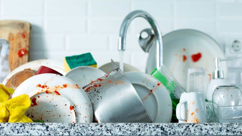 Why You Should Put A Dash Of Dish Soap Into Your Sink's Drain Before ...