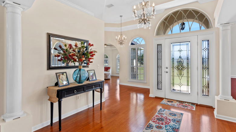 Foyer with off-white walls