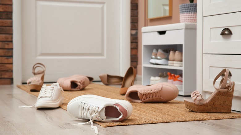 shoes on floor in entryway