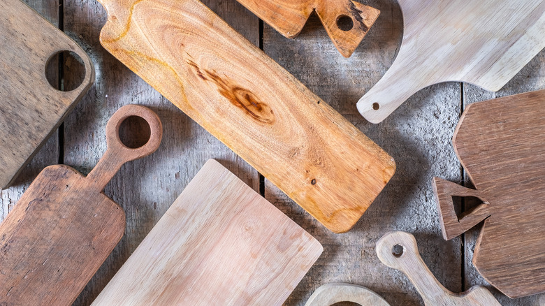 many wooden cutting boards