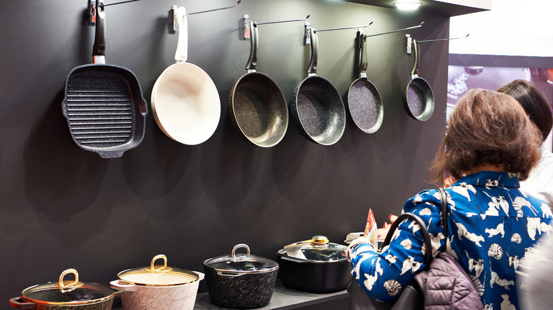 woman shopping cookware