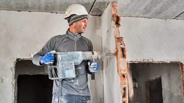 Contractor removing wall