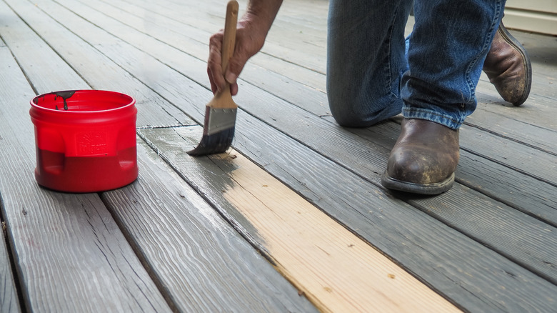 painting a deck plank