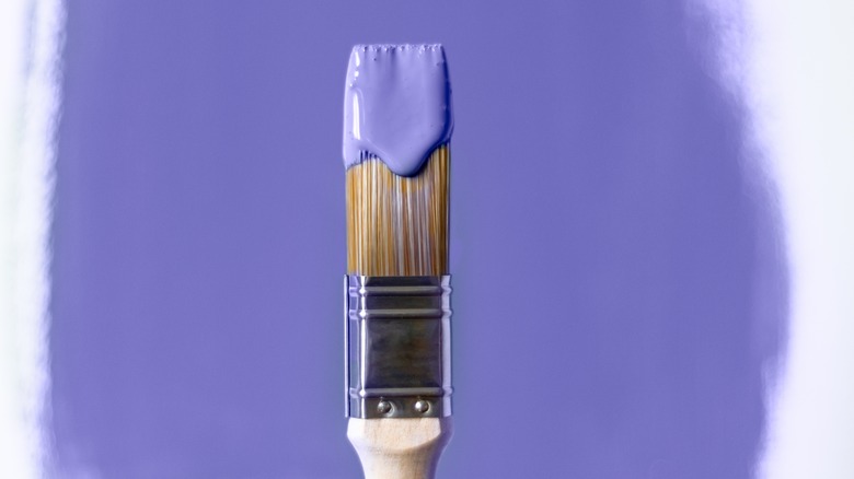 Paint brush with purple paint