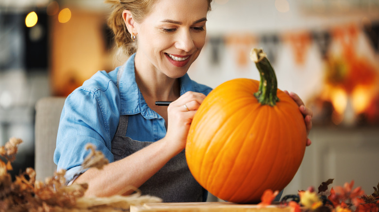 Using marker on pumpkin