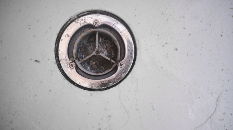 A clogged drain in a sink