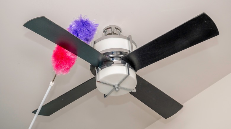 colorful duster cleaning ceiling fan