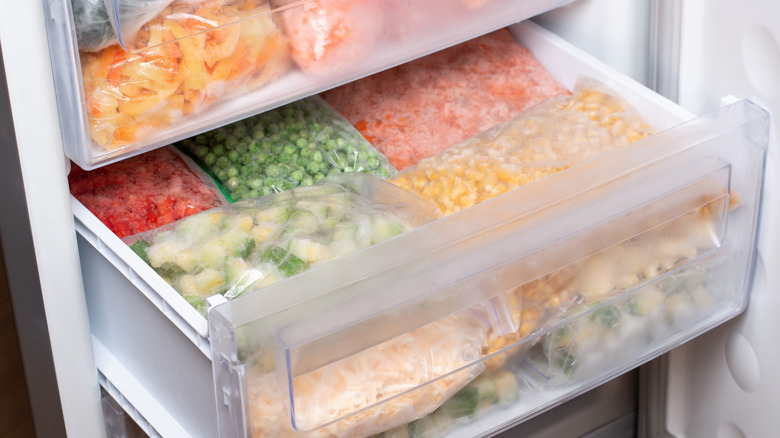 Frosted vegetables in fridge