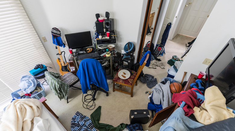 Messy and cluttered bedroom