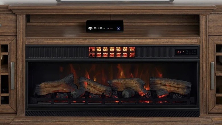 Closeup of electric fireplace feature in Costco combo TV stand and fireplace unit