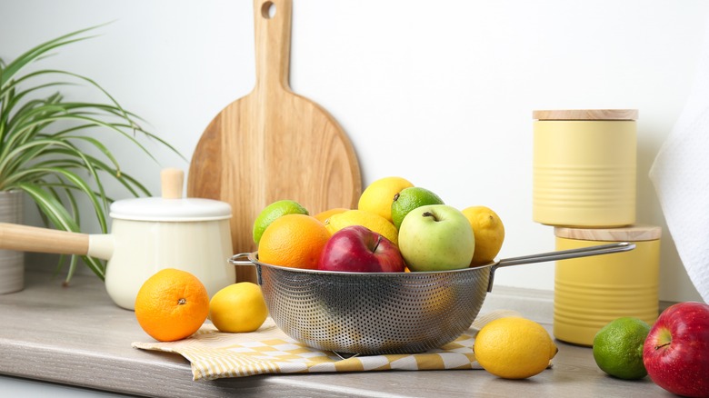 Fruits on kitchen shelf