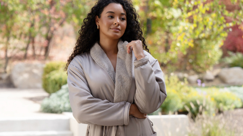 Woman in gray spa robe