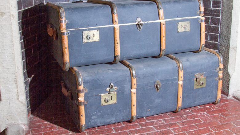 Blue vintage suitcases in fireplace