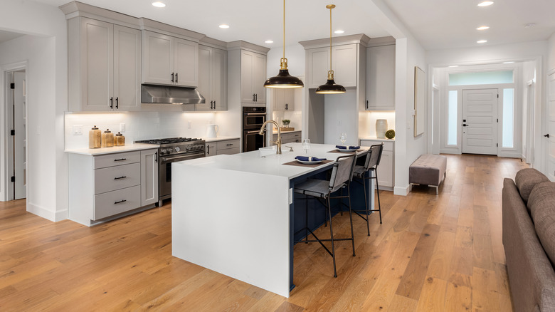 hardwood floors gray and white kitchen