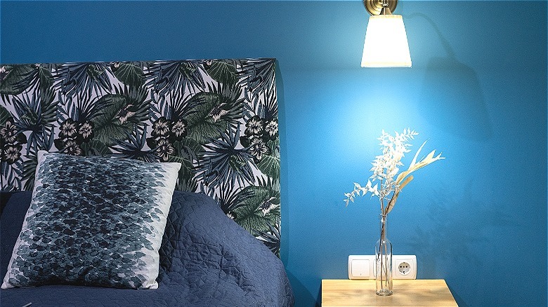 Dramatic blue walls in bedroom