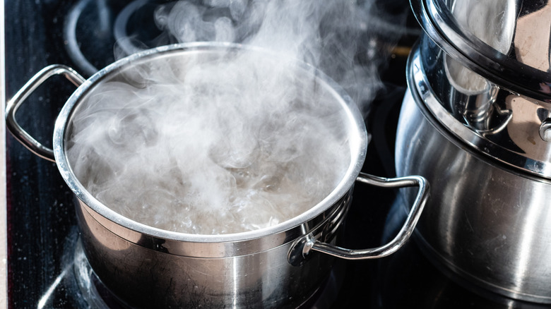 Aluminum pot of boiling water