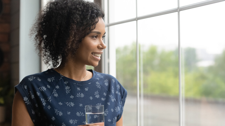 Woman by window