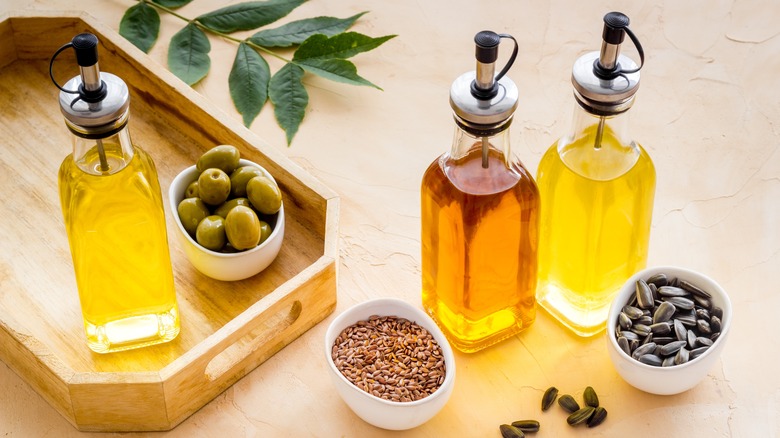 variety of oils in jars