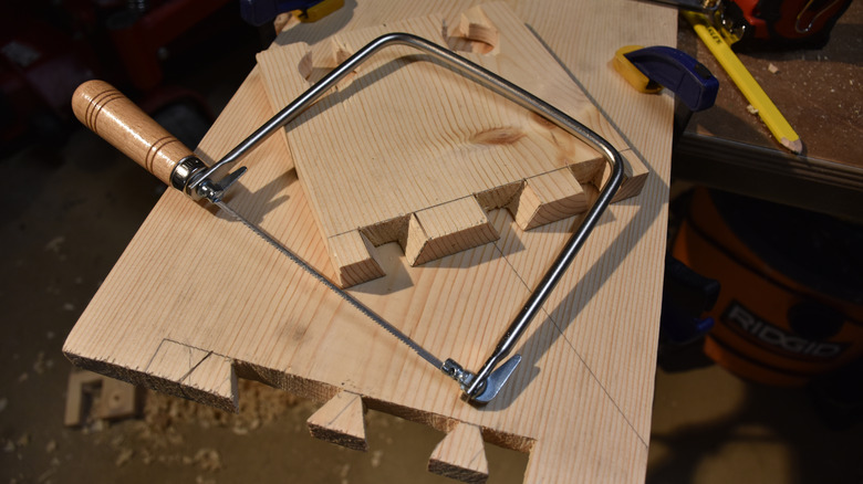 Coping saw used to make box joint cuts