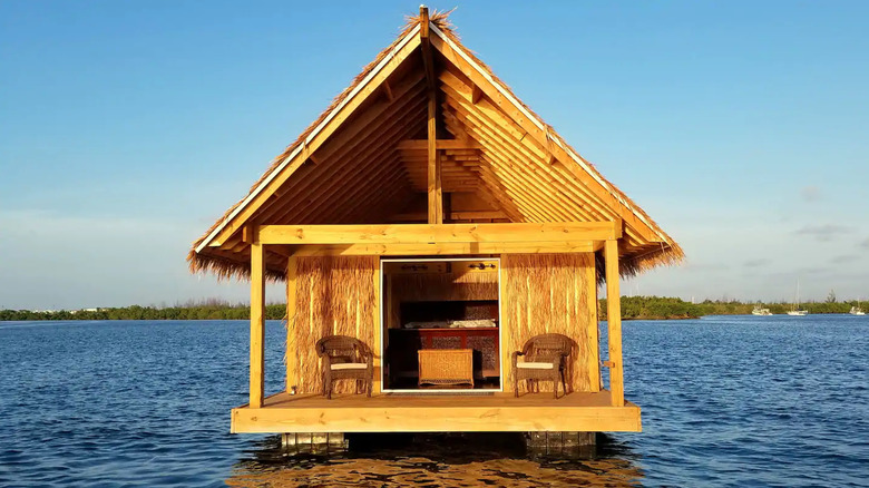 Tiki hut floating on water