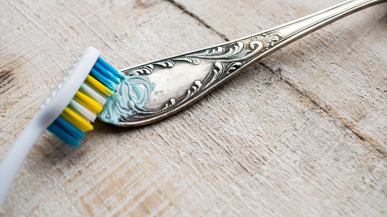Toothpaste on silver handle