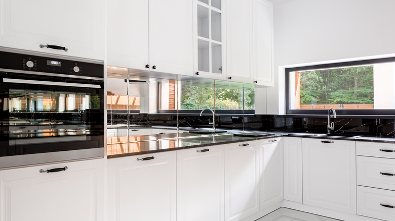 mirror backsplash in kitchen