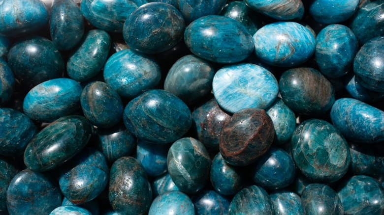 Bunch of tumbled apatite stones