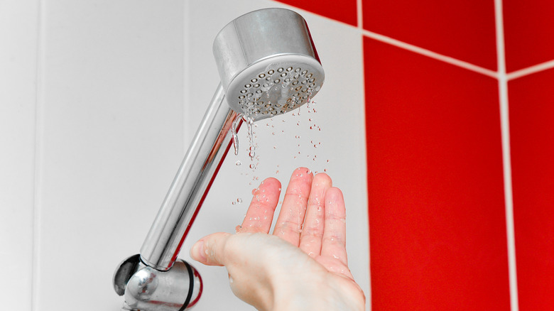 Trickle of water from showerhead