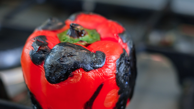 Pepper roasted over gas stovetop