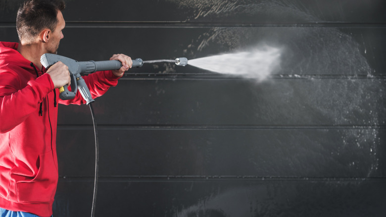 Pressure washing garage door