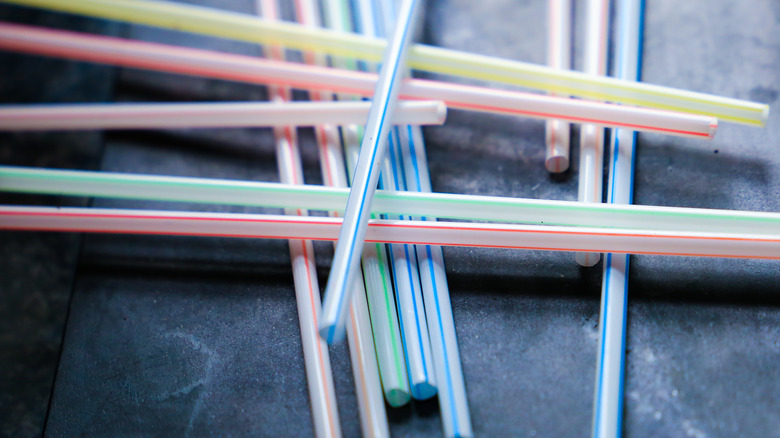 Colored drinking straws in pile