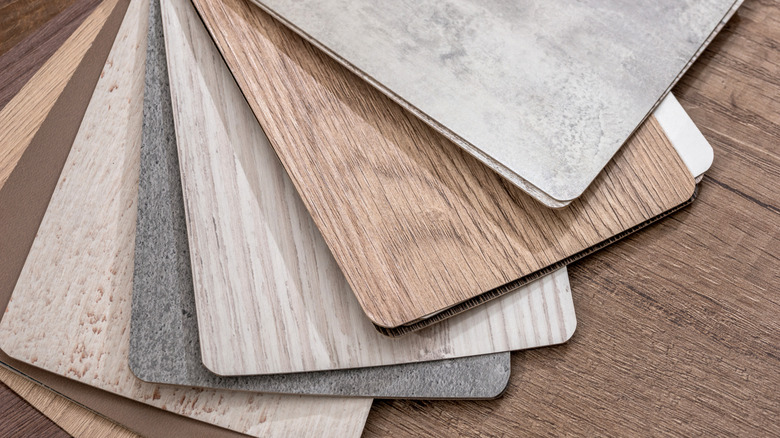 Several samples of color and design options for vinyl plank floors