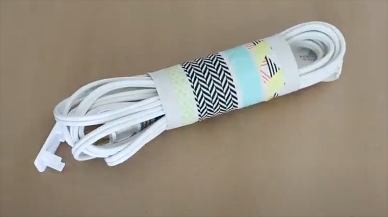 toilet paper roll cord organizer