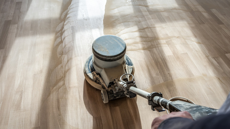 Sanding hardwood with a random orbital floor sander